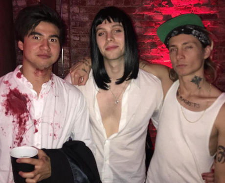 Calum Hood as a Reservoir Dog and Luke Hemmings as Mia Wallace from ...